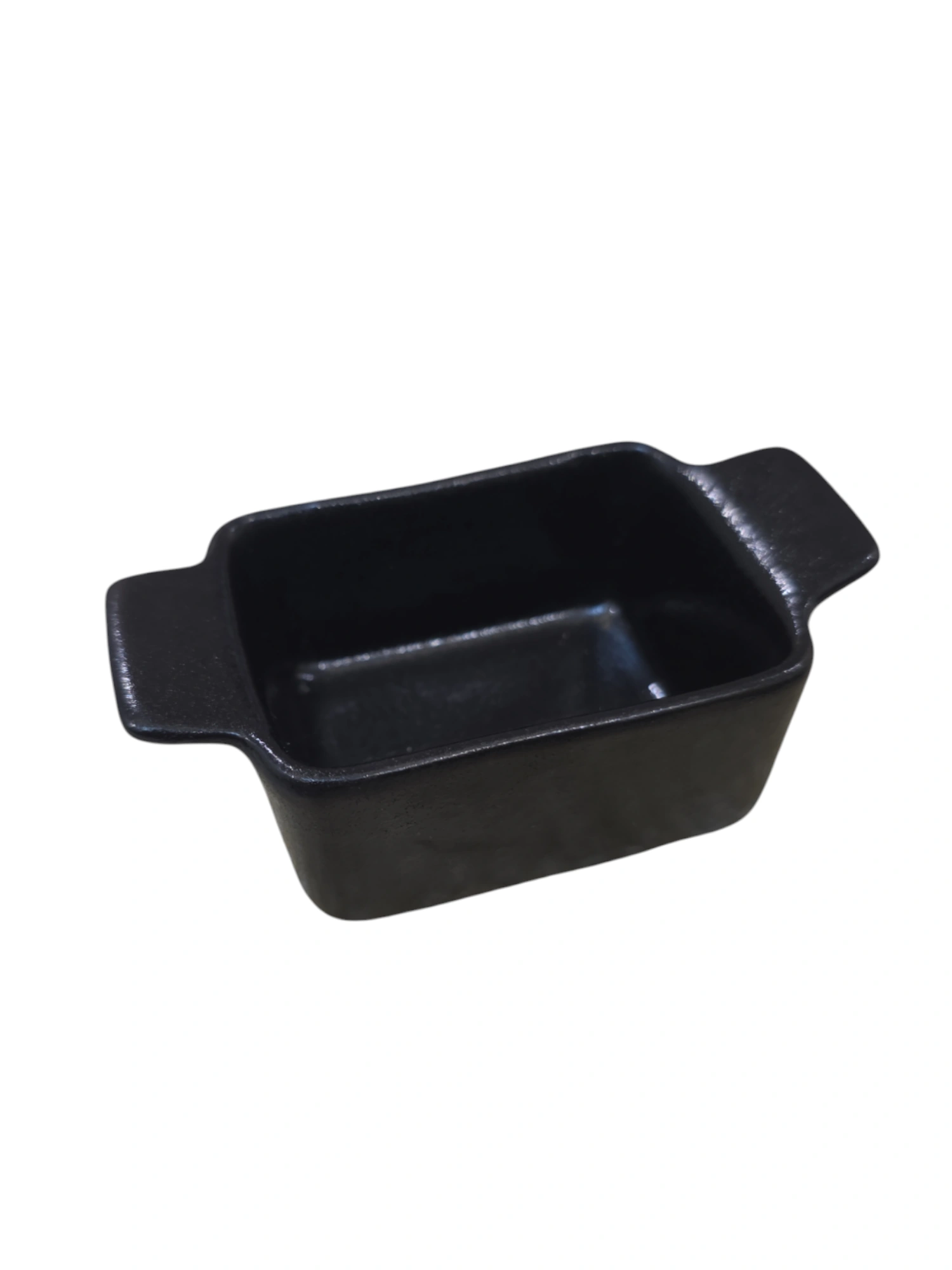 Petit plat rectangulaire en céramique noire mate avec poignées · 10,2 × 5,5 × 4 cm